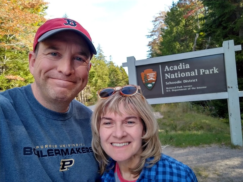 Photo with the Acadia sign