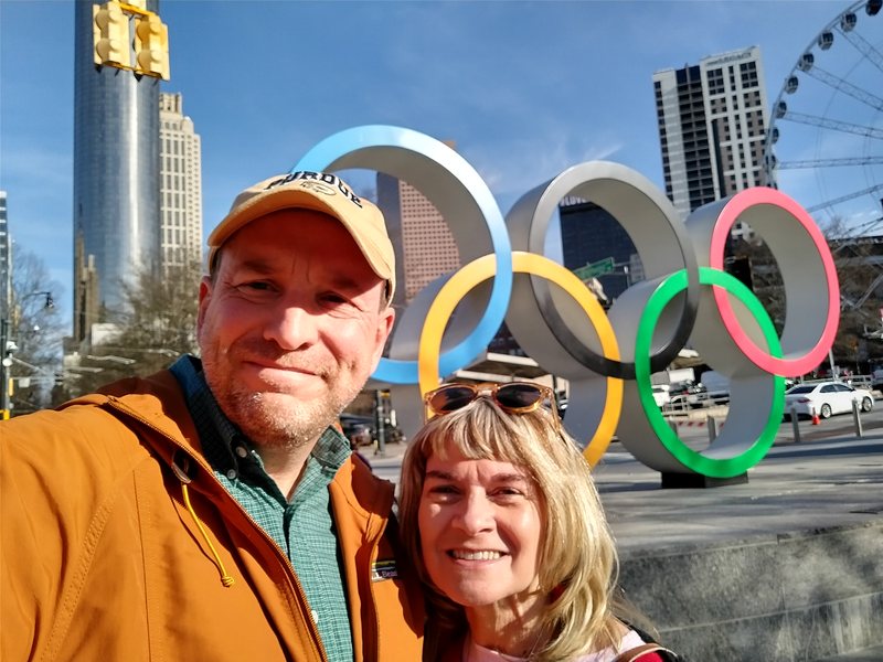 selfie of us in front of Olympic Rings in Atlanta